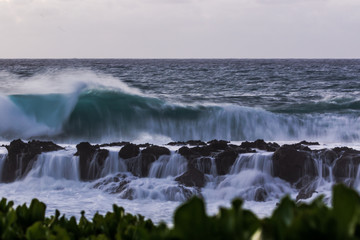 waves crashing on the rocks