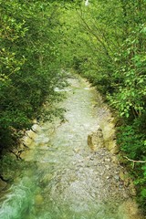 Fototapeta na wymiar Water in the Alps in drinking water quality