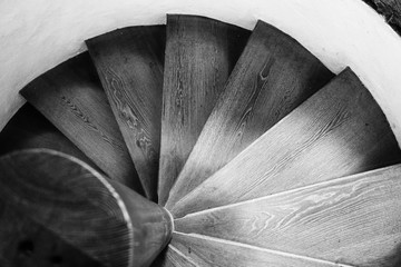 The spiral wooden steps in black and white