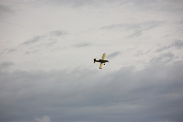 crop duster in sky