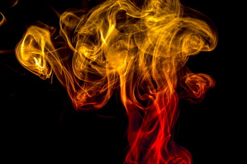 Colored smoke on black background