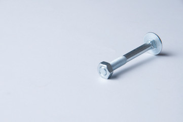 Metal bolt and nuts isolated on white background