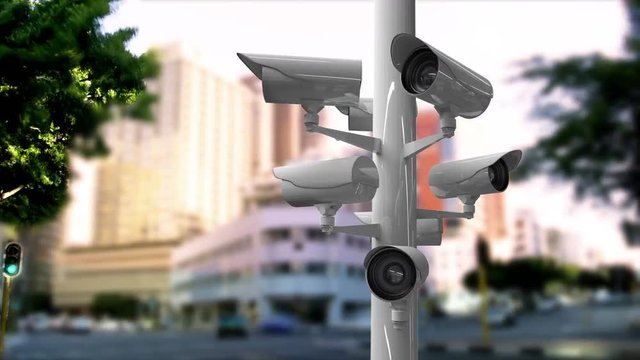 Surveillance cameras in a busy street