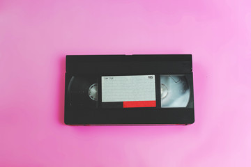 video vhs retro vintage cassette tape 70s, 80s, 90s style on pink background