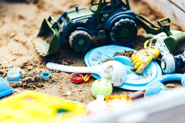 Summer Children's Toys on the sand, sand box, green tractor