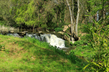 A rocky waterfall in the countryside at Hever in Kent