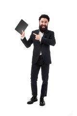 full length portrait of bearded businessman with tablet in hand, man pointing on blank tablet screen, isolated on white background