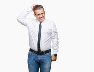 Middle age bussines arab man wearing glasses over isolated background confuse and wonder about question. Uncertain with doubt, thinking with hand on head. Pensive concept.