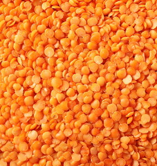 Red lentils background and texture