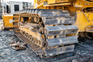 Metal Tracks on a Bulldozer on Construction Site.