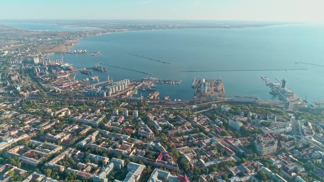 Aerial view from a drone of the Odessa old city downtown and sea port against a blue sky on a sunny day