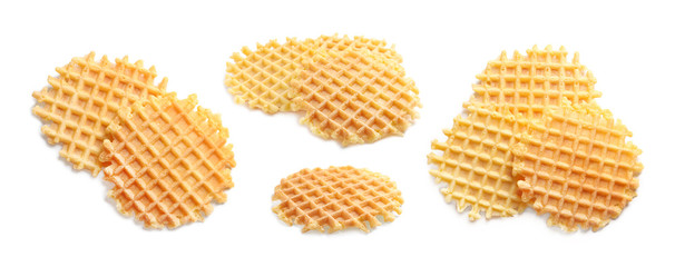 Set of delicious waffles on white background