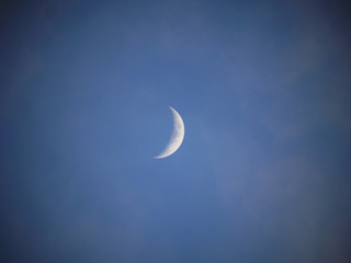 Obraz na płótnie Canvas half moon at blue sky