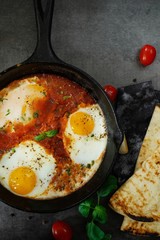 Homemade Shakshouka - Eggs poached in spicy tomato sauce