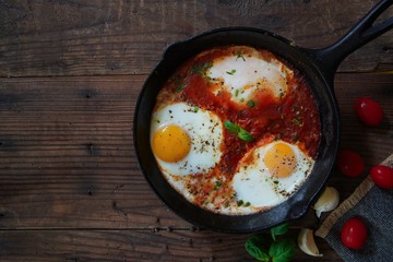 Homemade Shakshouka - Eggs poached in spicy tomato sauce