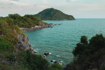 Fototapeta premium Beautiful sea view point with dramatic golden sky at Noen Nangphaya,famous andmark,Chanthaburi Province,Thailand. 