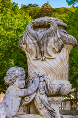 Obraz premium A beautiful fountain in the Jardin de la fontaine in Nimes, France