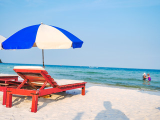 Outdoor with umbrella and chair on beautiful tropical beach and sea and blue sky background on Phu Quoc island Vietnam