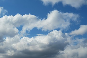 Fototapeta na wymiar Beautiful fluffy clouds in blue sky, natural background