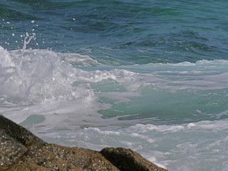 Waves crashing against the rock