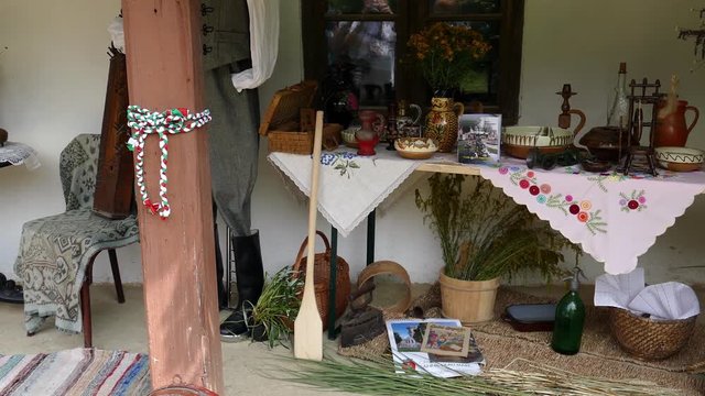 Traditional Hungarian objects exhibited on one home porch