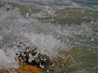 Waves crashing against the rock