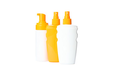 Sunscreen sprays isolated on white background. Summer vacation accessories