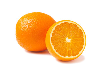Fresh oranges, one whole and one half isolated on white background with shadow