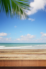 Beach background with palm tree and empty wooden, Summer.