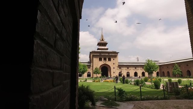Handheld, panning, exterior, wideshot of Mosque in Srinagar Kashmir