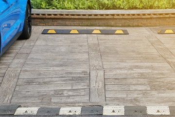 Empty Parking Space with Wood Lumber Pavment