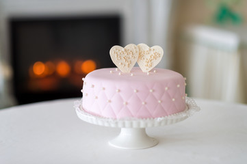 Wedding cake on a stand. Wedding preparations. Wedding Attributes