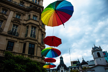 colorful umbrellas on the background of blue sky