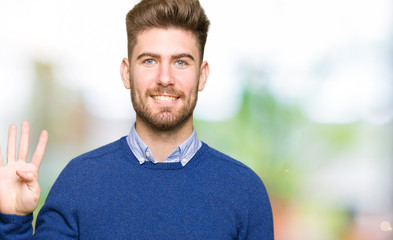 Young handsome bussines man showing and pointing up with fingers number four while smiling confident and happy.