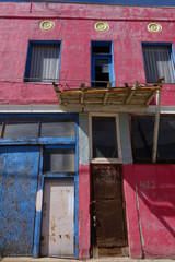 old wooden doors on abandoned building 