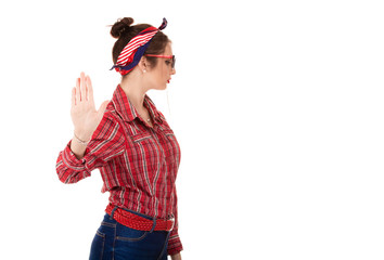 annoyed angry woman giving talk to hand gesture with palm outward