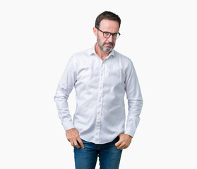 Handsome middle age elegant senior business man wearing glasses over isolated background skeptic and nervous, frowning upset because of problem. Negative person.