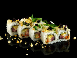 Set sushi roll. Traditional Japanese cuisine. Isolated on black background