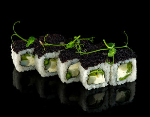 Set sushi roll. Traditional Japanese cuisine. Isolated on black background