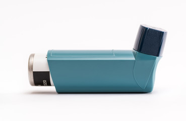 Portable asthma inhaler isolated on white background