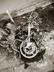 Burned luxury sport motorcycles in front of rue de Bassano a few meters Champs Elysees avenue after...