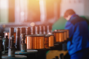 Production of copper wire, bronze cable in reels at factory