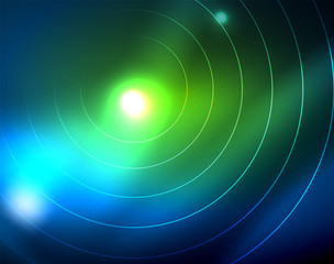 Blue neon circles, abstract circular lines. Glowing circle abstract pattern background