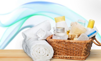 Bottles with organic essential aroma oils on background