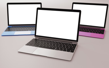 Three laptops with different colors and flat white screen.