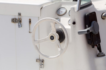 The control wheel on the ship