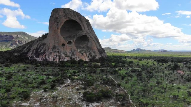 Cloudy day at Caatinga forest. Morro das Tocas, Itatim, Bahia, Brazil. Drone moving backwards 4K