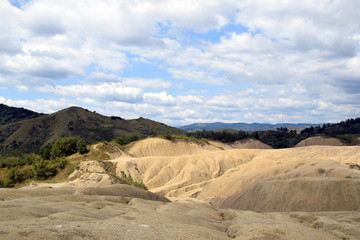 Dry, cracked earth near Mud Volcanoes (Vulcanii Noroiosi) in Berca. Buzau, Romania.