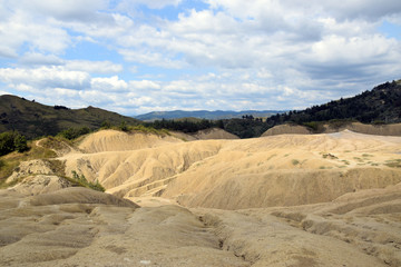 Dry, cracked earth near Mud Volcanoes (Vulcanii Noroiosi) in Berca. Buzau, Romania.