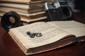 old book and glasses